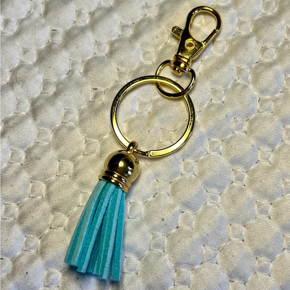Leather tassel keychain. Turquoise and gold.